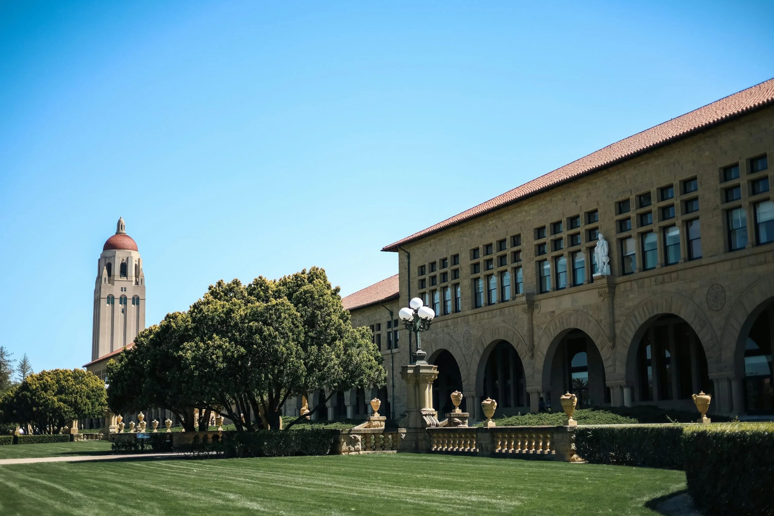 a large building with a clock tower in the background